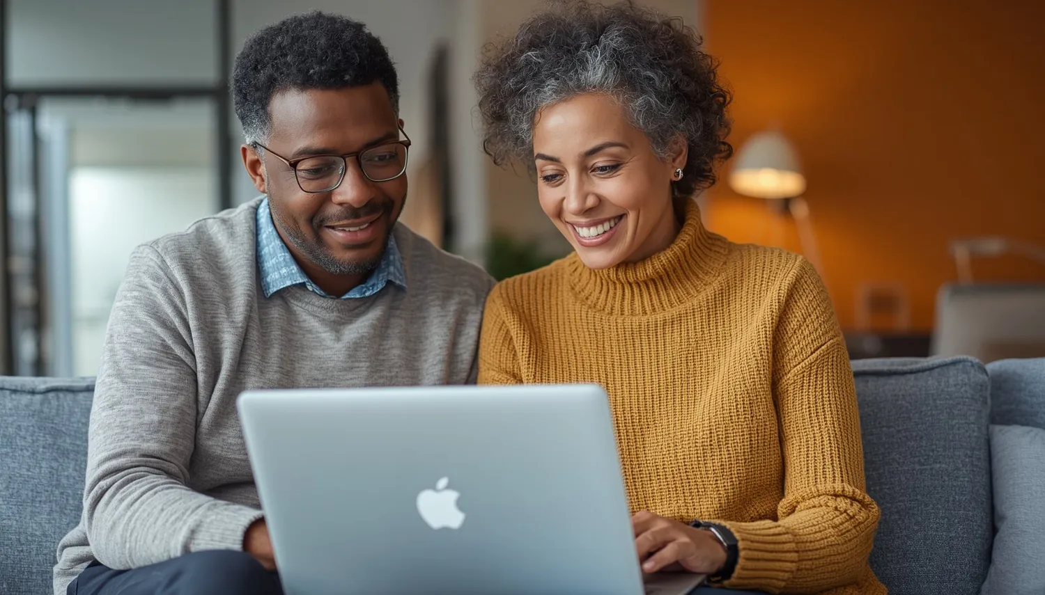 A couple reviewing documents together at home
